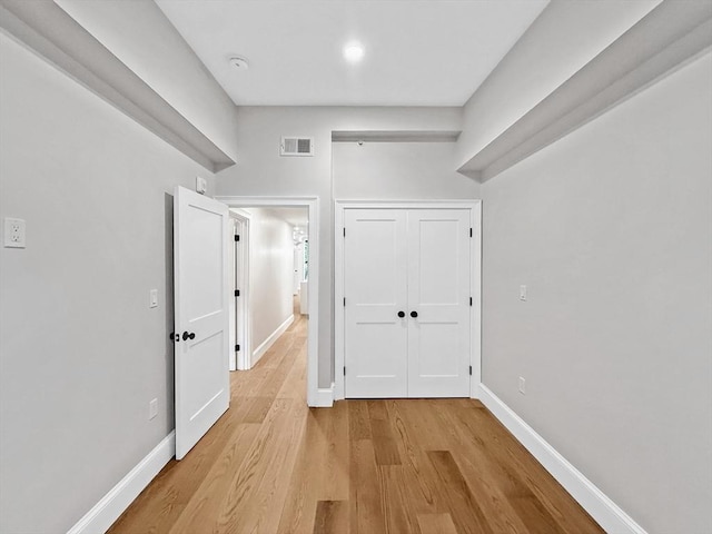 667 Tremont St Unit 2, Boston, MA 02118 - unfurnished bedroom featuring light wood finished floors, baseboards, and a closet