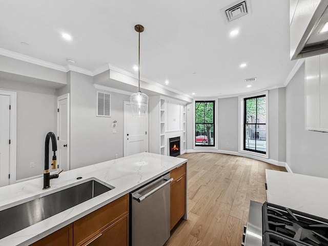 667 Tremont St Unit 2, Boston, MA 02118 - kitchen featuring a sink, dishwasher, brown cabinetry, ornamental molding, and light wood-type flooring