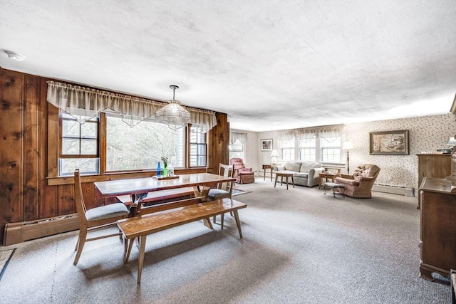 25 First Ave, Wellfleet, MA 02667 - carpeted dining room featuring wallpapered walls, a baseboard heating unit, and baseboard heating