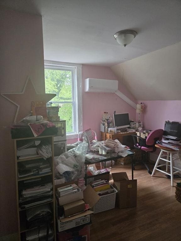 88 Esmond St, Boston, MA 02121 - home office featuring a wall unit AC, wood finished floors, and vaulted ceiling