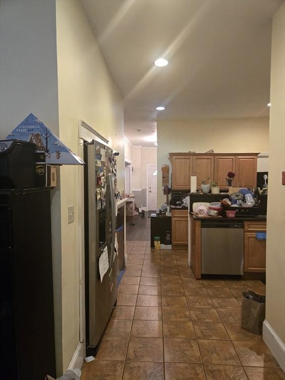 88 Esmond St, Boston, MA 02121 - kitchen with appliances with stainless steel finishes, dark tile patterned floors, dark countertops, brown cabinetry, and recessed lighting