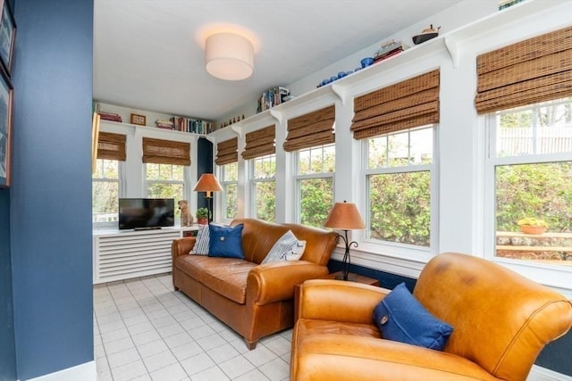 sunroom featuring tile patterned floors