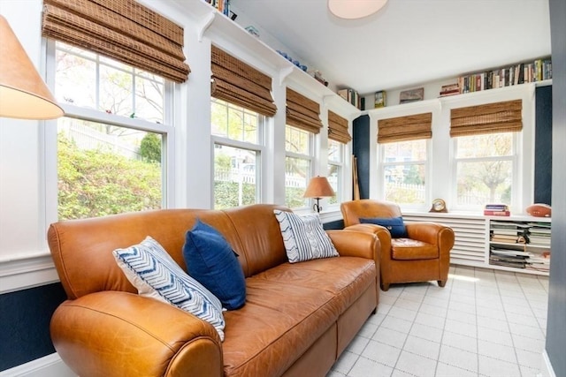 sunroom / solarium with tile patterned flooring