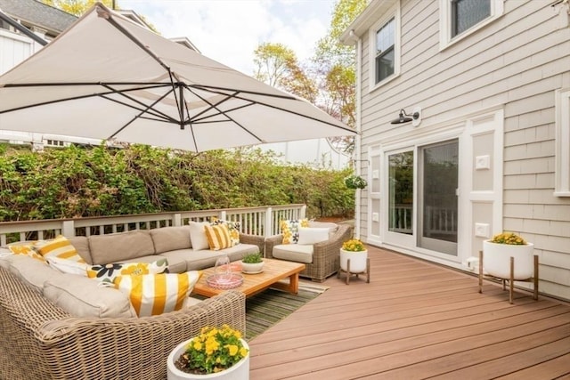 wooden deck featuring an outdoor hangout area