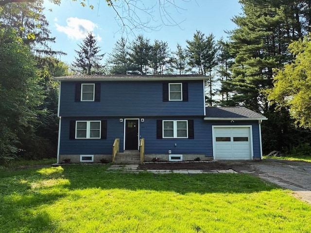 101 E Hadley Rd, Amherst, MA 01002 - colonial house with a garage, driveway, and a front lawn