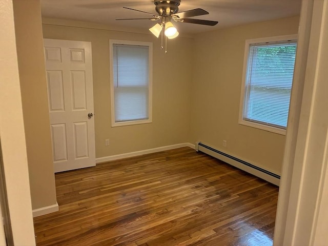 101 E Hadley Rd, Amherst, MA 01002 - unfurnished room with a baseboard radiator, wood finished floors, and ceiling fan