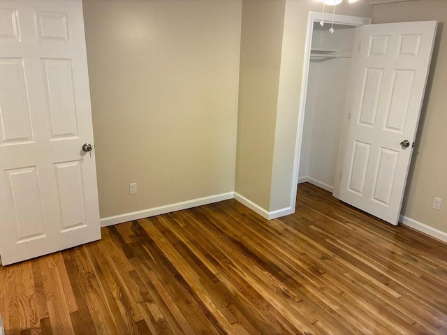 101 E Hadley Rd, Amherst, MA 01002 - unfurnished bedroom with wood finished floors and a closet