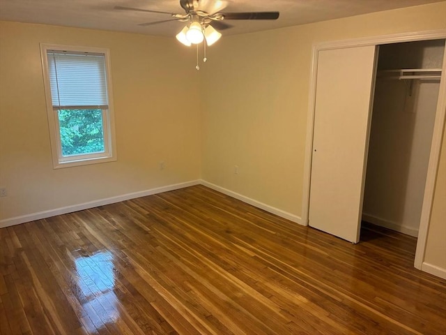 101 E Hadley Rd, Amherst, MA 01002 - unfurnished bedroom with wood-type flooring, a closet, and a ceiling fan