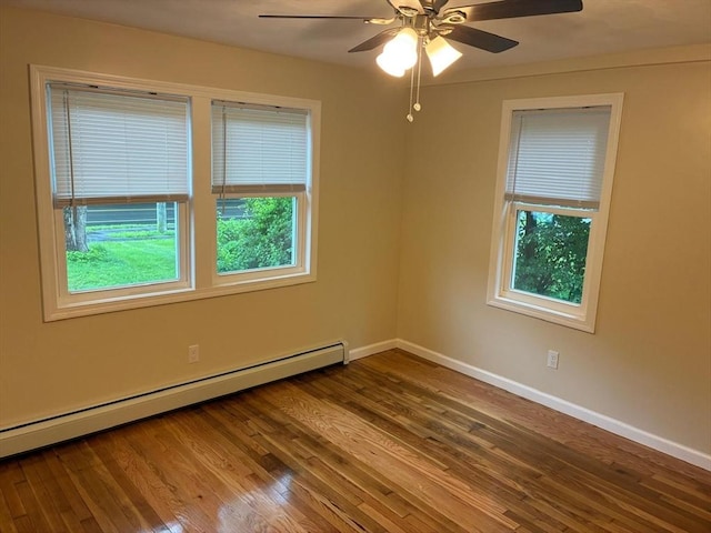 101 E Hadley Rd, Amherst, MA 01002 - empty room featuring a baseboard radiator, a ceiling fan, and wood finished floors