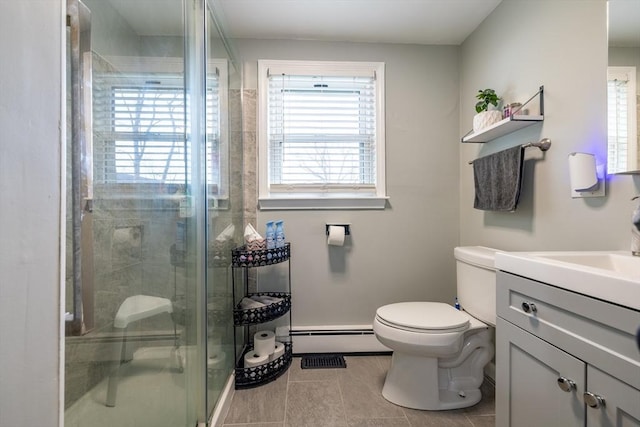 full bathroom featuring baseboard heating, vanity, toilet, tile patterned floors, and a stall shower