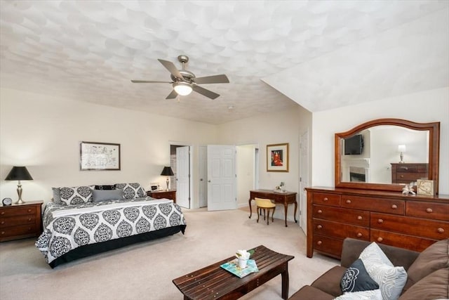carpeted bedroom with a ceiling fan