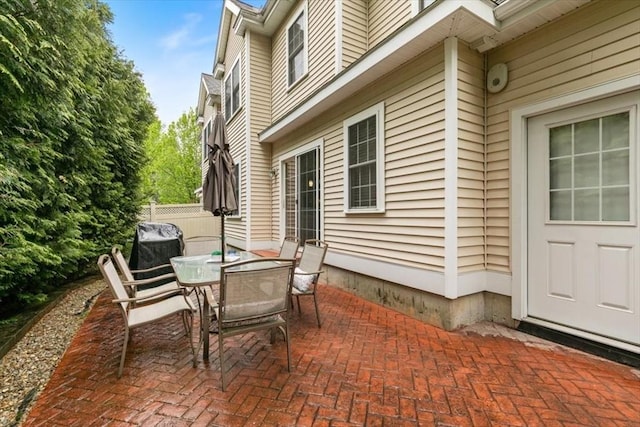 view of patio / terrace with fence and outdoor dining space
