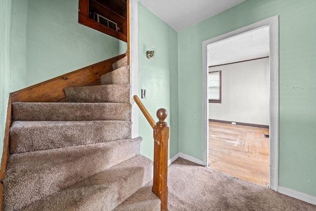 62 County St, Taunton, MA 02780 - staircase featuring baseboards and carpet
