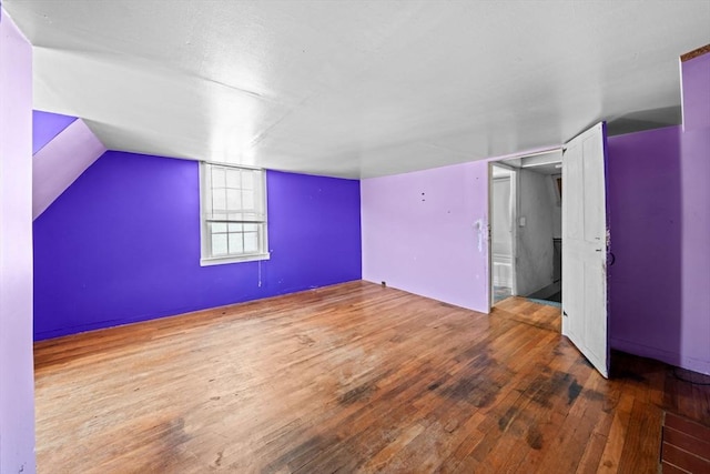62 County St, Taunton, MA 02780 - unfurnished bedroom featuring wood-type flooring and lofted ceiling