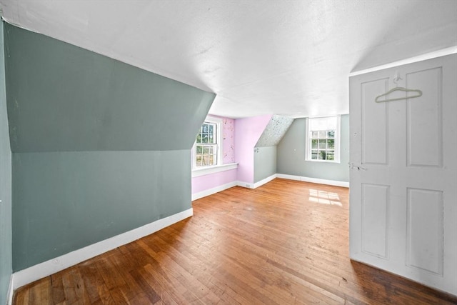 62 County St, Taunton, MA 02780 - bonus room featuring wood-type flooring, baseboards, and vaulted ceiling