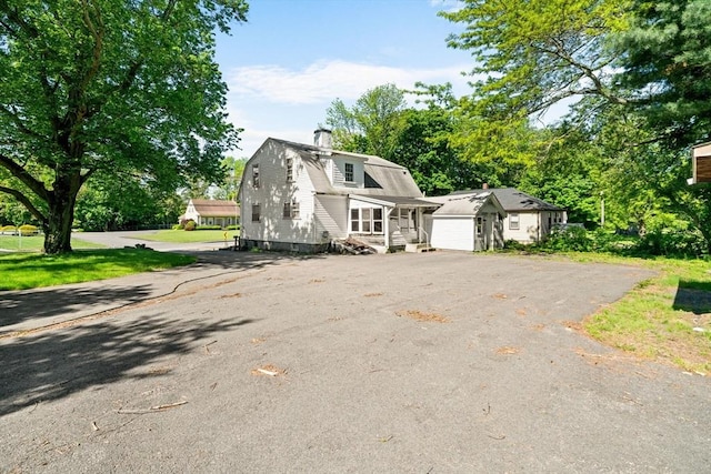 62 County St, Taunton, MA 02780 - dutch colonial featuring a chimney and a gambrel roof