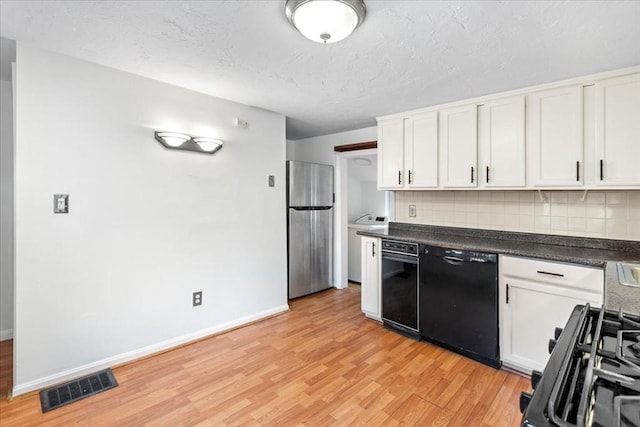 kitchen featuring black appliances, light wood-type flooring, backsplash, white cabinets, and dark countertops