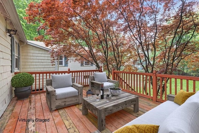 wooden deck with an outdoor living space