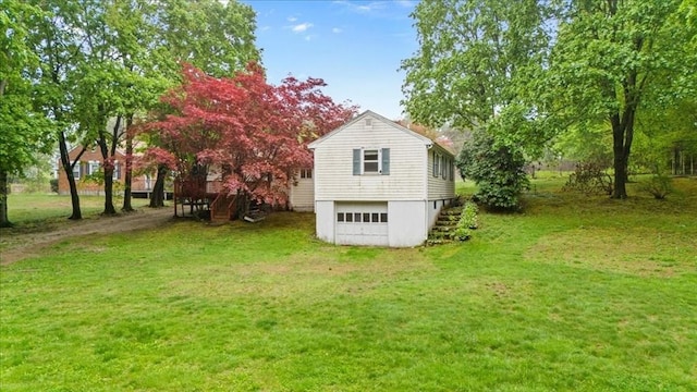 view of outbuilding with stairway