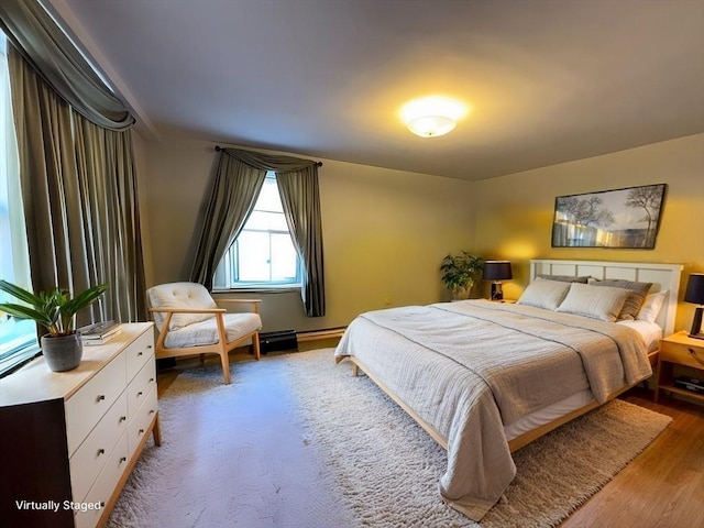 bedroom featuring wood-type flooring