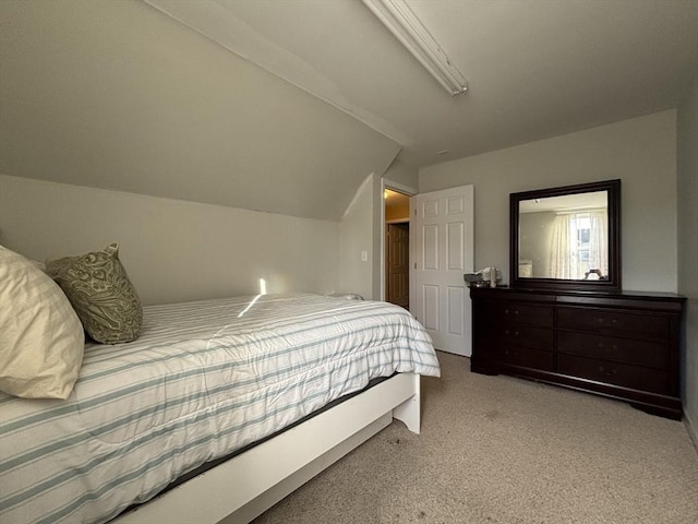 bedroom with vaulted ceiling