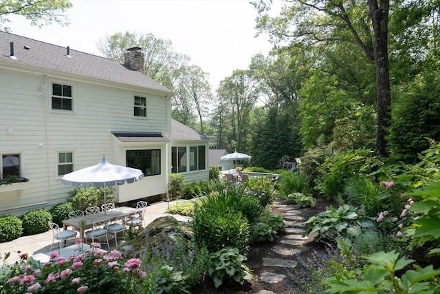 130 Hickory Rd, Weston, MA 02493 - view of yard featuring a patio and outdoor dining area