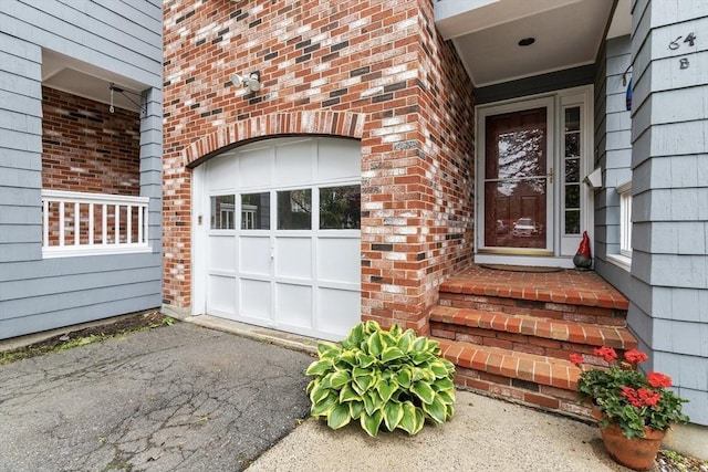 64 Prospect St Unit B, Marblehead, MA 01945 - entrance to property with brick siding and a garage