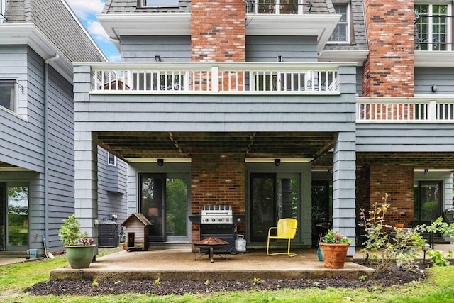 64 Prospect St Unit B, Marblehead, MA 01945 - rear view of property with a patio area and cooling unit