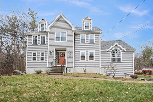 view of front of property with a front lawn