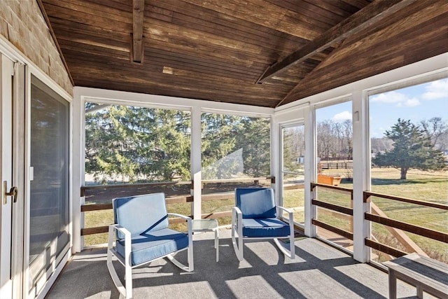 sunroom with wood ceiling and lofted ceiling with beams