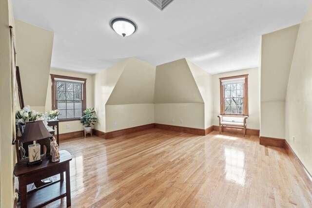72 Charlemont St, Newton, MA 02461 - bonus room with healthy amount of natural light, light wood-style flooring, and baseboards