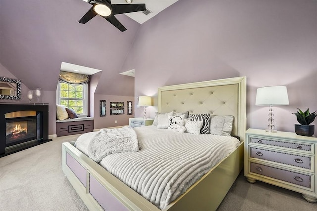 14 Weld St, Westborough, MA 01581 - bedroom featuring carpet flooring, lofted ceiling, a glass covered fireplace, and a ceiling fan