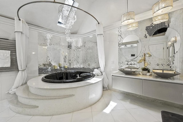 14 Weld St, Westborough, MA 01581 - bathroom with a chandelier, tile patterned flooring, vanity, and a bath