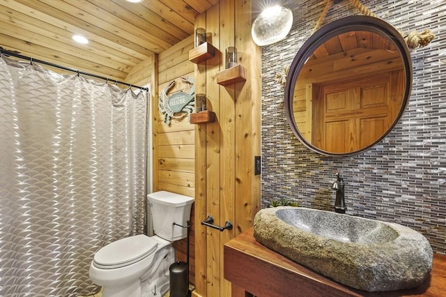 14 Weld St, Westborough, MA 01581 - bathroom with a sink, wood ceiling, toilet, recessed lighting, and curtained shower