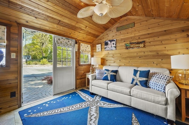 14 Weld St, Westborough, MA 01581 - living room with lofted ceiling, wood walls, wood ceiling, and a ceiling fan