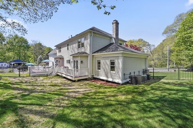 14 Weld St, Westborough, MA 01581 - rear view of property featuring a chimney, a wooden deck, roof with shingles, and cooling unit
