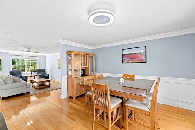 43 N Main St Unit B, Berkley, MA 02779 - dining room featuring crown molding, light wood-style floors, ceiling fan, and wainscoting