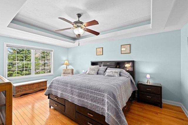 43 N Main St Unit B, Berkley, MA 02779 - bedroom with a raised ceiling, light wood-style flooring, and a ceiling fan