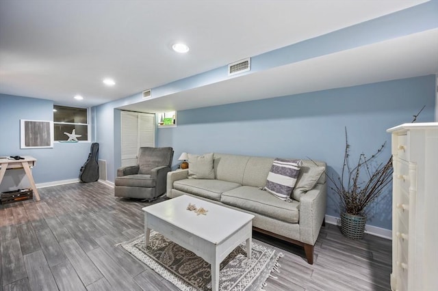 89 W Elm St, Pembroke, MA 02359 - living area with wood finished floors and recessed lighting