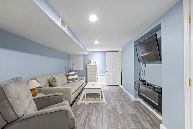 89 W Elm St, Pembroke, MA 02359 - living area featuring wood finished floors and recessed lighting