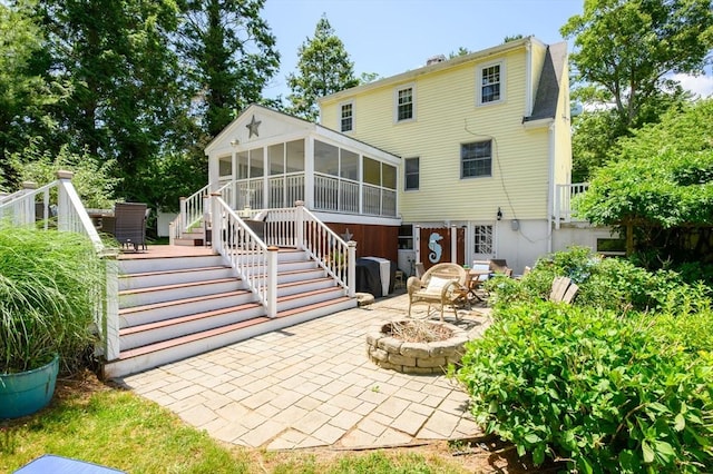 89 W Elm St, Pembroke, MA 02359 - back of house featuring stairs, a sunroom, a fire pit, a patio area, and a wooden deck