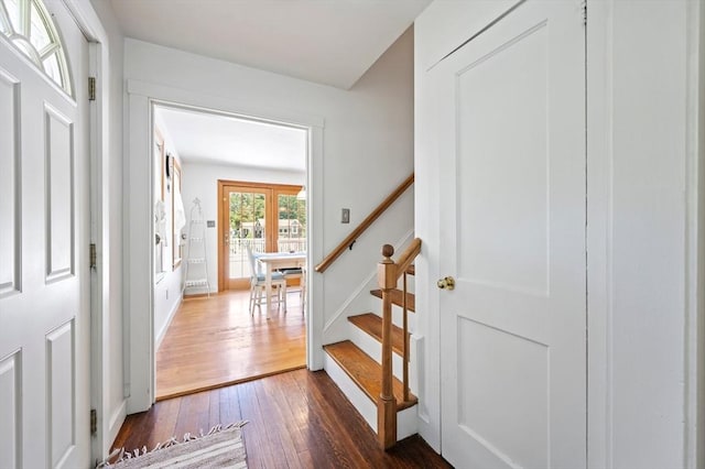 89 W Elm St, Pembroke, MA 02359 - foyer entrance featuring dark wood finished floors and stairs