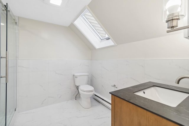 bathroom featuring vaulted ceiling with skylight, a shower with shower door, vanity, baseboard heating, and toilet