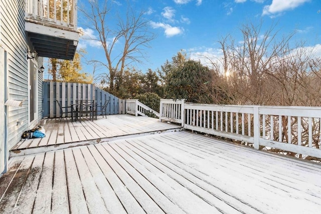 view of snow covered deck