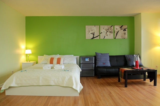 bedroom featuring light hardwood / wood-style flooring