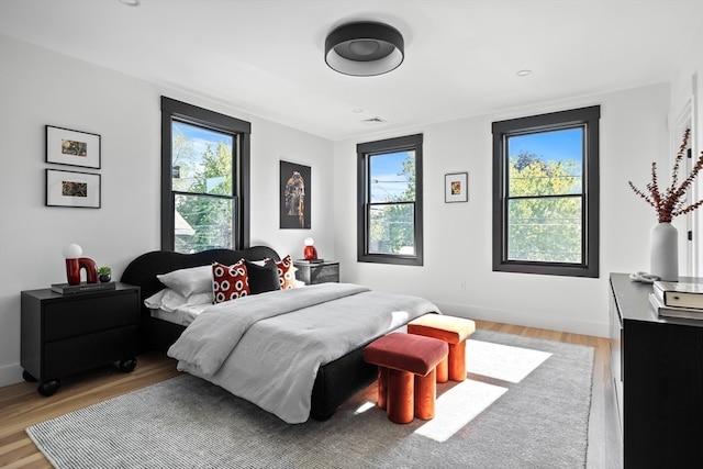 bedroom featuring light hardwood / wood-style floors