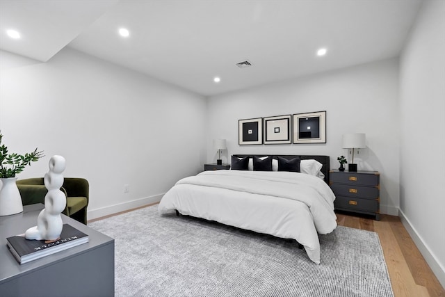 bedroom with wood-type flooring