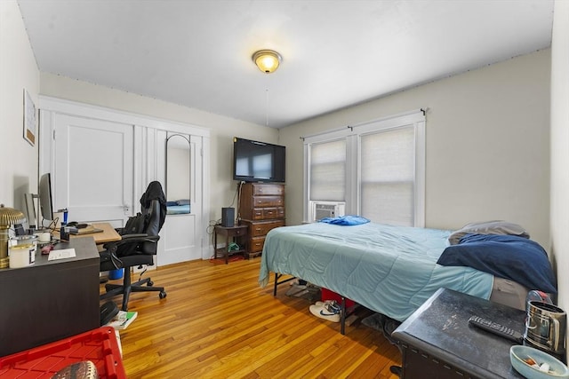 bedroom featuring hardwood / wood-style flooring