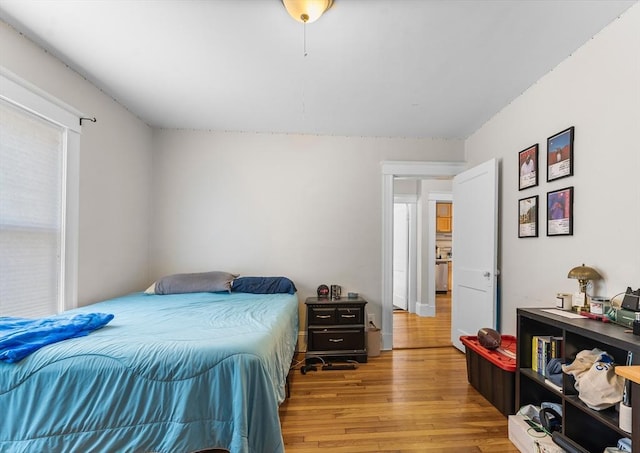 bedroom with light hardwood / wood-style flooring