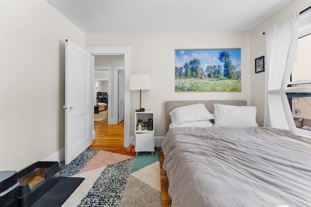 bedroom featuring hardwood / wood-style flooring